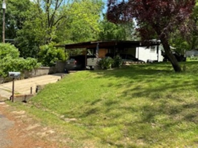 Lake Home For Sale in Chidester, Arkansas