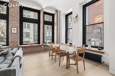 1 Great Jones Street also known as 682 Broadway sits at one of - photo 5