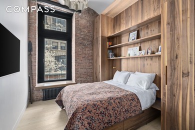 1 Great Jones Street also known as 682 Broadway sits at one of - photo 7