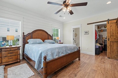 Nestled amongst majestic Live Oaks on one of Waveland's most - photo 12