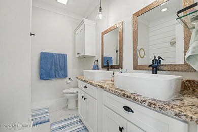 Nestled amongst majestic Live Oaks on one of Waveland's most - photo 14
