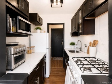 Welcome home to this bright and inviting top-floor one-bedroom - photo 5