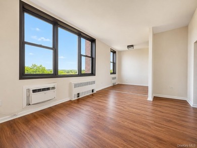 Welcome home to this bright and inviting top-floor one-bedroom - photo 6