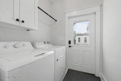Nestled amongst majestic Live Oaks on one of Waveland's most - photo 22