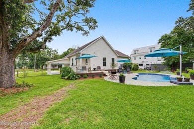 Nestled amongst majestic Live Oaks on one of Waveland's most - photo 25