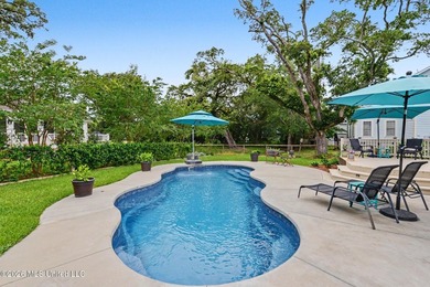 Nestled amongst majestic Live Oaks on one of Waveland's most - photo 27