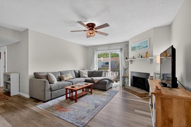 Beautifully updated second-floor condominium located on the - photo 1