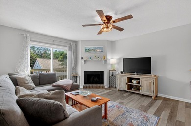 Beautifully updated second-floor condominium located on the - photo 3