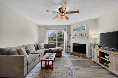 Beautifully updated second-floor condominium located on the - photo 7