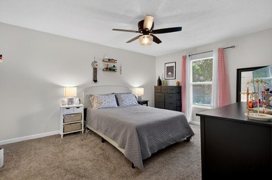 Beautifully updated second-floor condominium located on the - photo 9