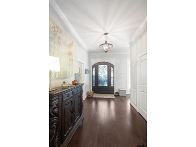 Welcome to this exquisite 5-bedroom, 5-bathroom waterfront home