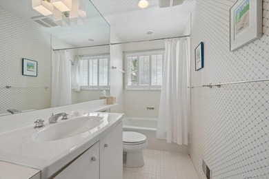 Quogue Waterfront Tucked away on a quiet, coveted creek in - photo 19