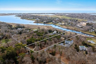 Quogue Waterfront Tucked away on a quiet, coveted creek in - photo 24