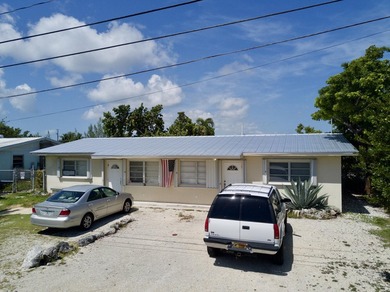 Waterfront DUPLEX ~ CBS Construction 4BD/2BA with 2BD|1BA on - photo 1