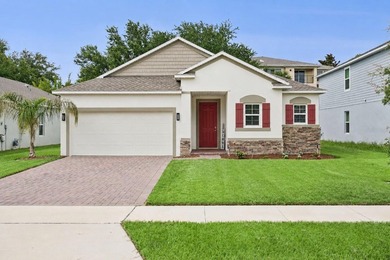 Welcome home to this beautifully maintained 2023-built residence - photo 1