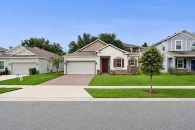 Welcome home to this beautifully maintained 2023-built residence - photo 4