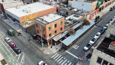 Park-front commercial building on a corner lot directly across - photo 4
