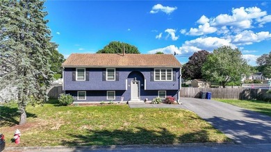 Welcome home to this beautifully maintained 3-bedroom raised - photo 1