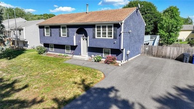 Welcome home to this beautifully maintained 3-bedroom raised - photo 3