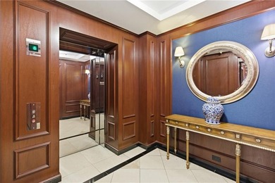 Set high above the shoreline in the prestigious Carnegie Tower - photo 17
