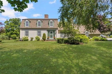 Nestled on a beautifully maintained corner lot in one of - photo 1