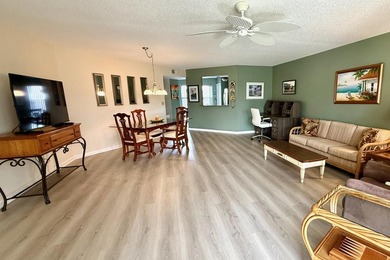 Updated, fully furnished two-bedroom, two-bathroom condo located - photo 4