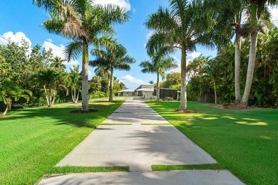 Jupiter waterfront paradise! This 3BR/3.5BA CBS home with office - photo 3