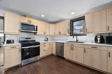 This updated contemporary city home features a convenient floor - photo 2
