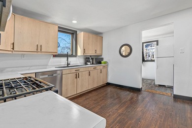 This updated contemporary city home features a convenient floor - photo 4