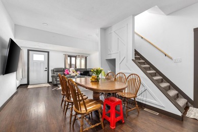 This updated contemporary city home features a convenient floor - photo 5