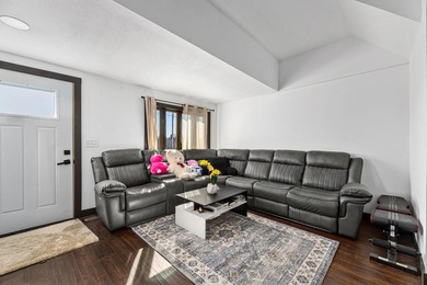 This updated contemporary city home features a convenient floor - photo 8