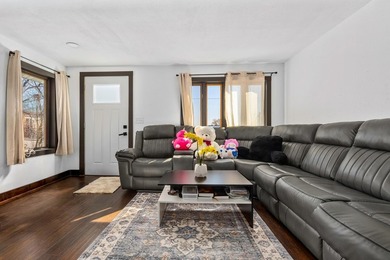 This updated contemporary city home features a convenient floor - photo 9