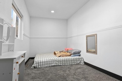 This updated contemporary city home features a convenient floor - photo 10