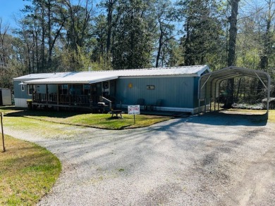 Located only blocks from Toledo Bend Lake! - Lake Home For Sale in Hemphill, Texas
