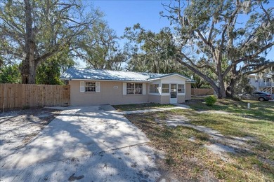 Situated on over a quarter-acre on a quiet dead-end street, this - photo 22