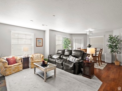 Enjoy easy living in this beautiful South Jordan condo featuring