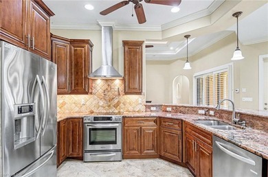 This exceptional single story Moorings residence offers a - photo 7