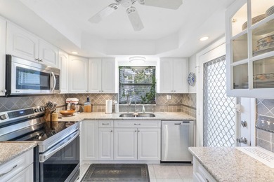 LOVELY 1ST FLOOR UNIT WITH MODERN KITCHEN AND BATHS. 2019 A/C - photo 9