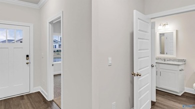 This stunning residence features 4 spacious bedrooms, 3 elegant - photo 7