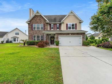 Welcome to this spacious three-story home with peaceful pond - photo 1