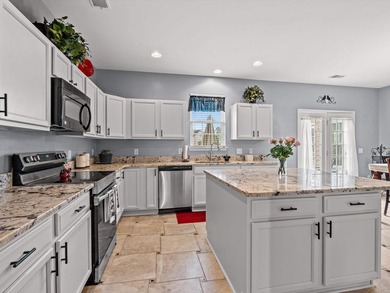 Welcome to this spacious three-story home with peaceful pond - photo 3