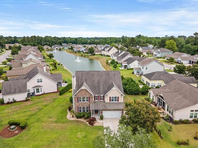 Welcome to this spacious three-story home with peaceful pond - photo 4