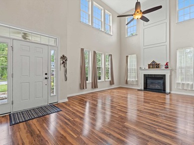 Welcome to this spacious three-story home with peaceful pond - photo 5