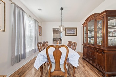 Welcome to this spacious three-story home with peaceful pond - photo 9