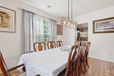 Welcome to this spacious three-story home with peaceful pond - photo 10