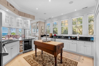 Welcome to an extraordinary oceanfront estate nestled behind - photo 6