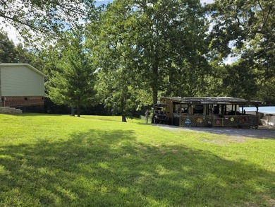 Charming lake retreat featuring a seasonal water view and - photo 6