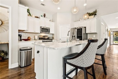 Welcome to easy, elegant living in this stunning 2-bedroom