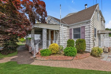 Don't let the classic curb appeal fool you! This beautifully - photo 1