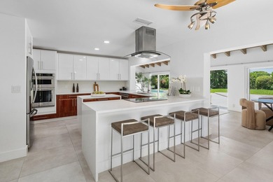 Located in the prestigious Seagate Country Club, this - photo 17